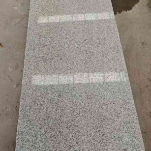 长春芝麻白光面毛板